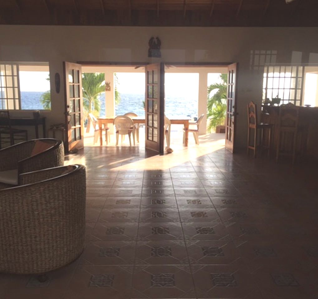 Idyllic Waterfront Villa Rental with Freshwater and Saltwater Swimming Pools in Negril, Jamaica