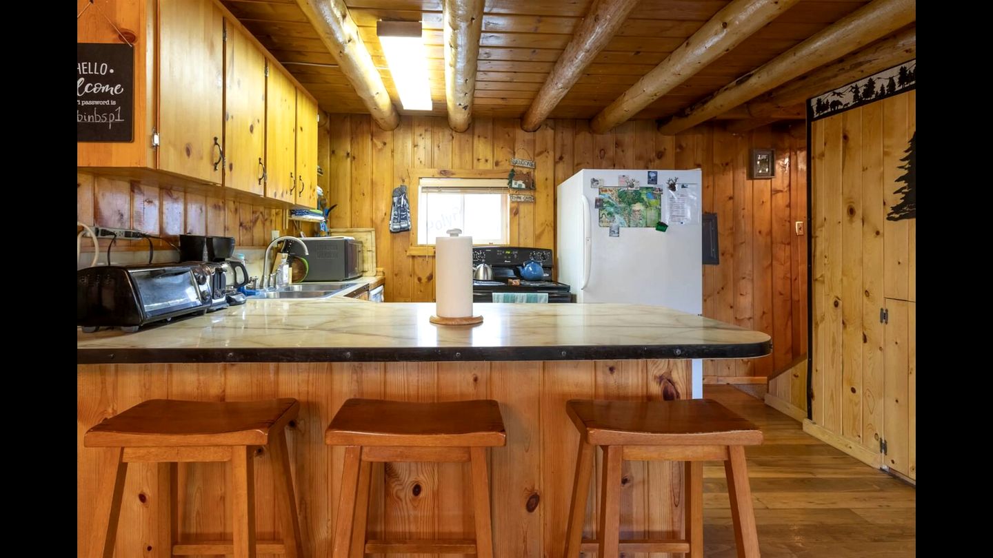Rustic Cabin Retreat with Private Pond & Hot Tub near Island Park, Idaho