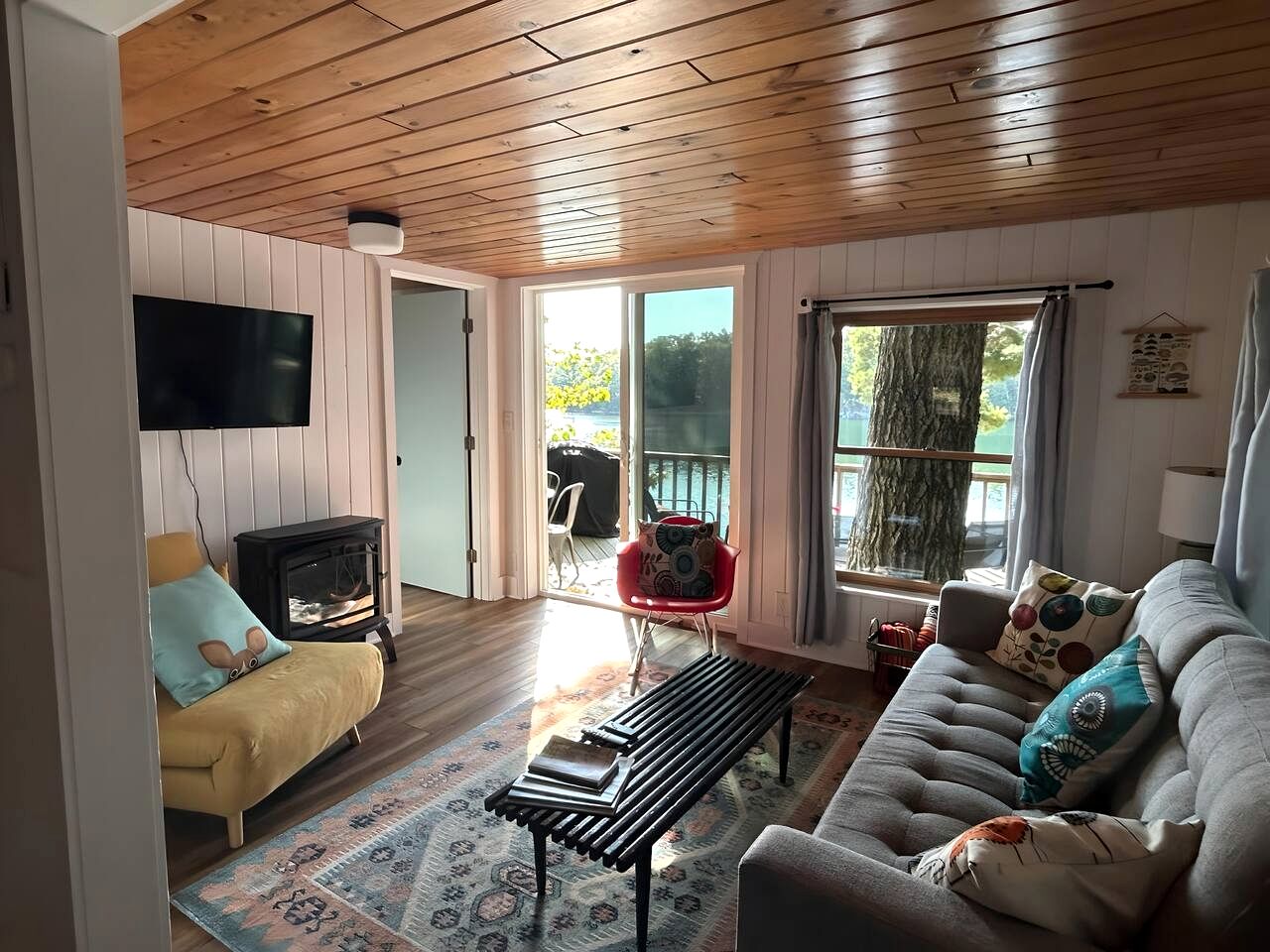 Charming Waterfront Cabins with Hot Tub & Private Beach Access near Traverse City, Michigan