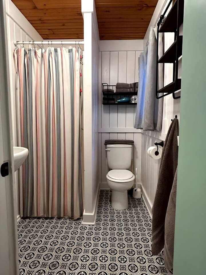 Charming Waterfront Cabins with Hot Tub & Private Beach Access near Traverse City, Michigan