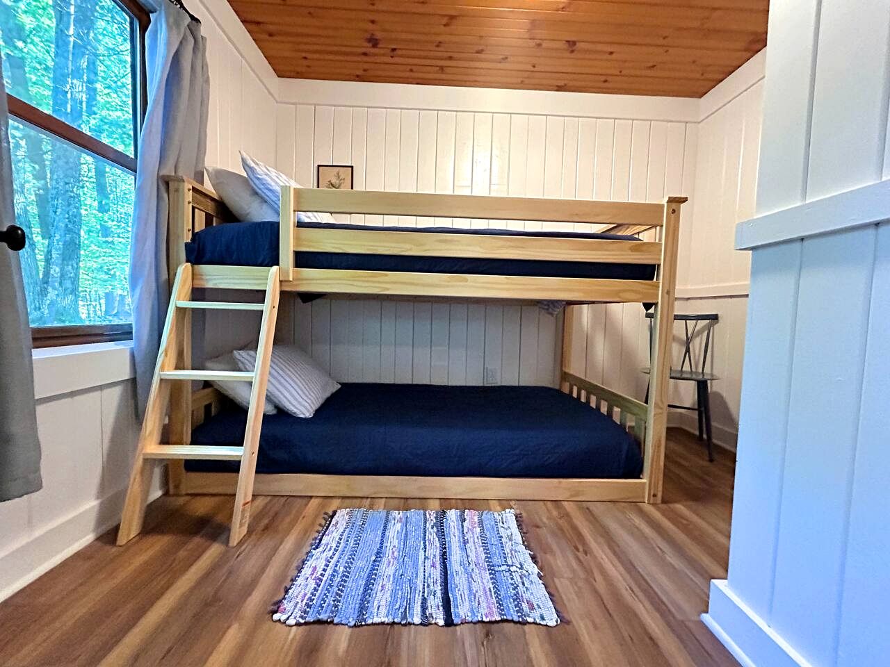 Charming Waterfront Cabins with Hot Tub & Private Beach Access near Traverse City, Michigan