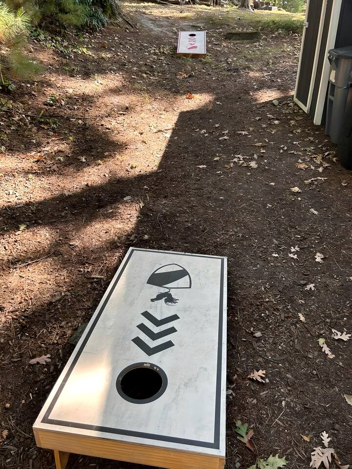 Charming Waterfront Cabins with Hot Tub & Private Beach Access near Traverse City, Michigan