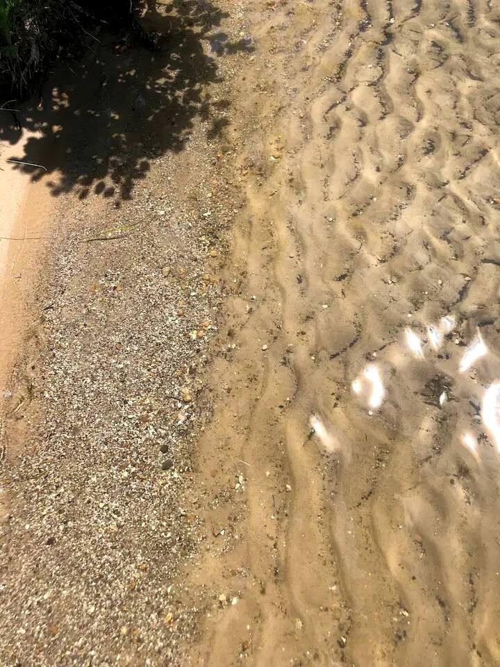 Charming Waterfront Cabins with Hot Tub & Private Beach Access near Traverse City, Michigan