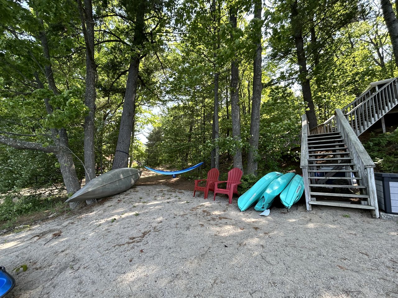 Charming Waterfront Cabins with Hot Tub & Private Beach Access near Traverse City, Michigan
