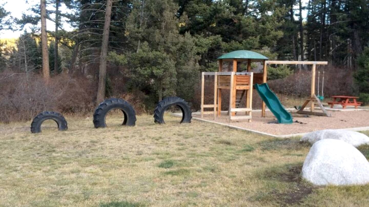 Rustic Conestoga Wagon Stay with Lodge Amenities near Boulder Creek, Montana