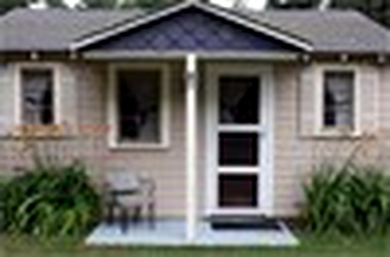 Wonderful Cabin with Lake Access, Barbecue and Tennis Court in Carp Lake, Michigan