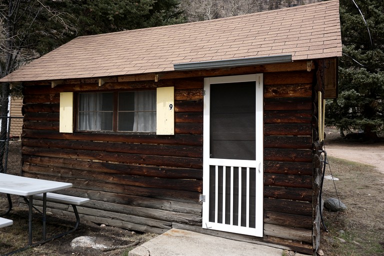 Simple Country Cabin with Ornate Wood Stove in the Colorado Mountains of Poudre Canyon