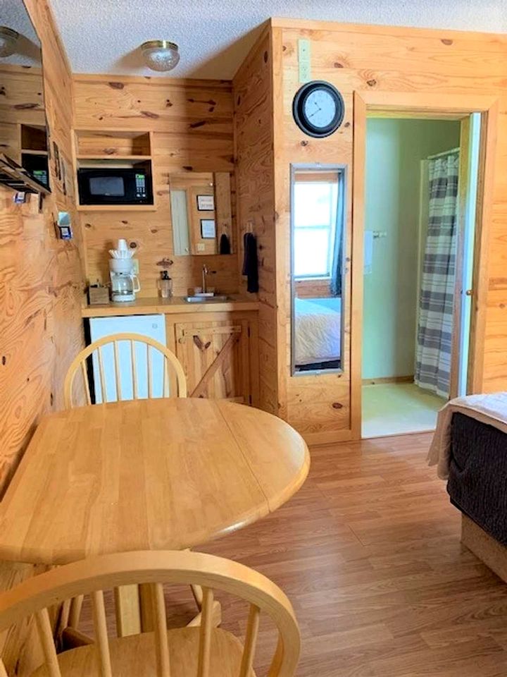 Modern Cabin with Gorgeous Wood Paneled Walls Nestled in the Scenic Beauty of the Ozarks