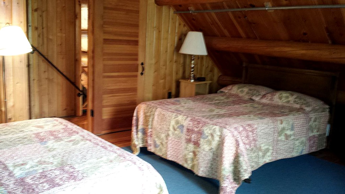 Rustic Camping Cabin with Fireplace in Private Woods near Bangor, Maine