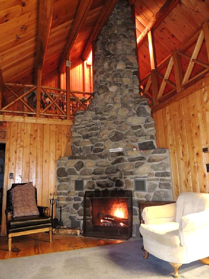 Rustic Camping Cabin with Fireplace in Private Woods near Bangor, Maine