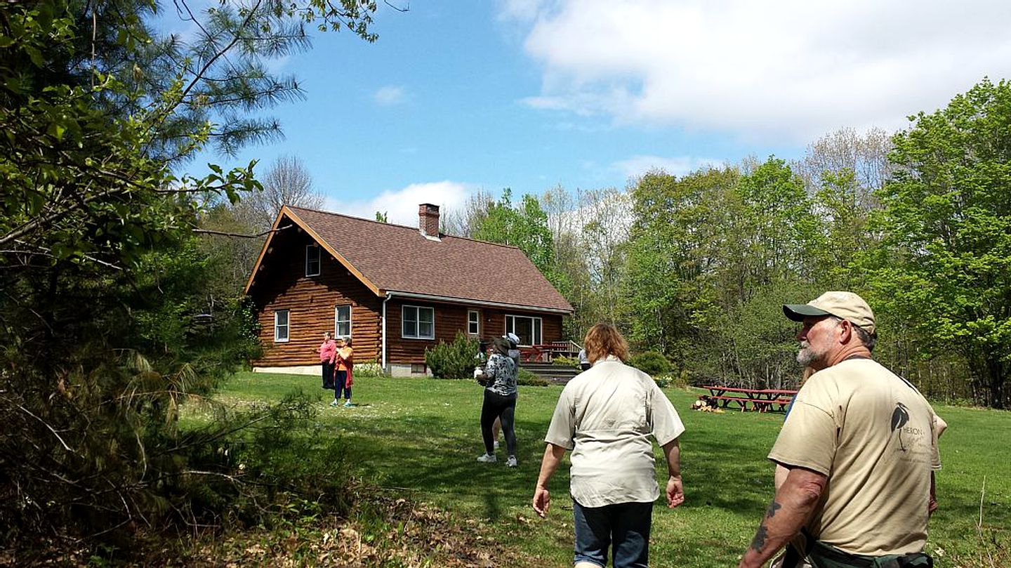 Rustic Camping Cabin with Fireplace in Private Woods near Bangor, Maine