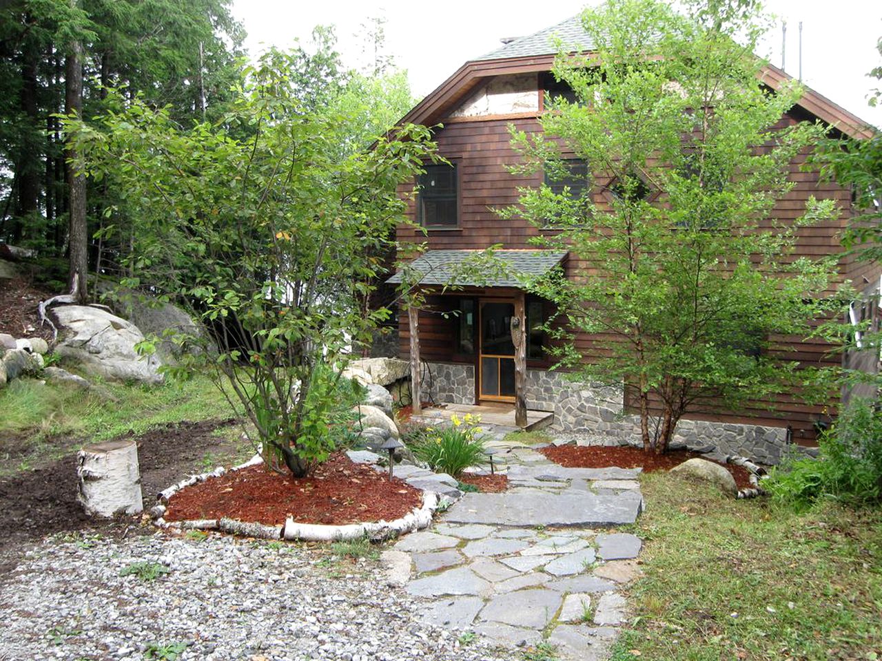 Stunning Waterfront Cabin with a Boathouse on Tupper Lake in New York