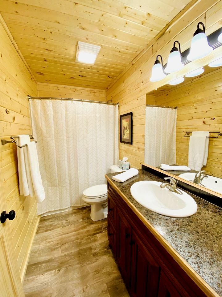 Group Lake Cabin with Ping Pong Table Loaded with Kayaks in Wisconsin