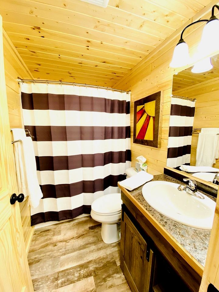 Group Lake Cabin with Ping Pong Table Loaded with Kayaks in Wisconsin
