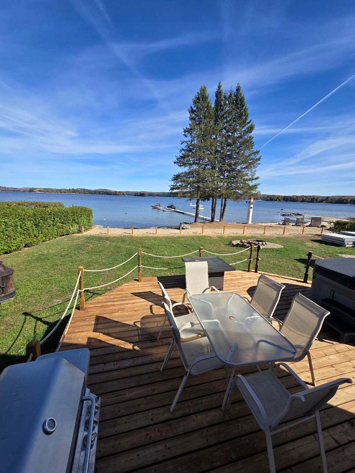 Peaceful Waterfront Chalet with Private Dock and Mountain Views near Chénéville, QC