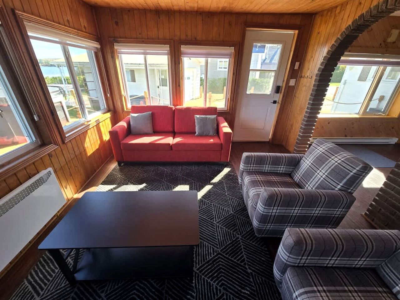 Peaceful Waterfront Chalet with Private Dock and Mountain Views near Chénéville, QC