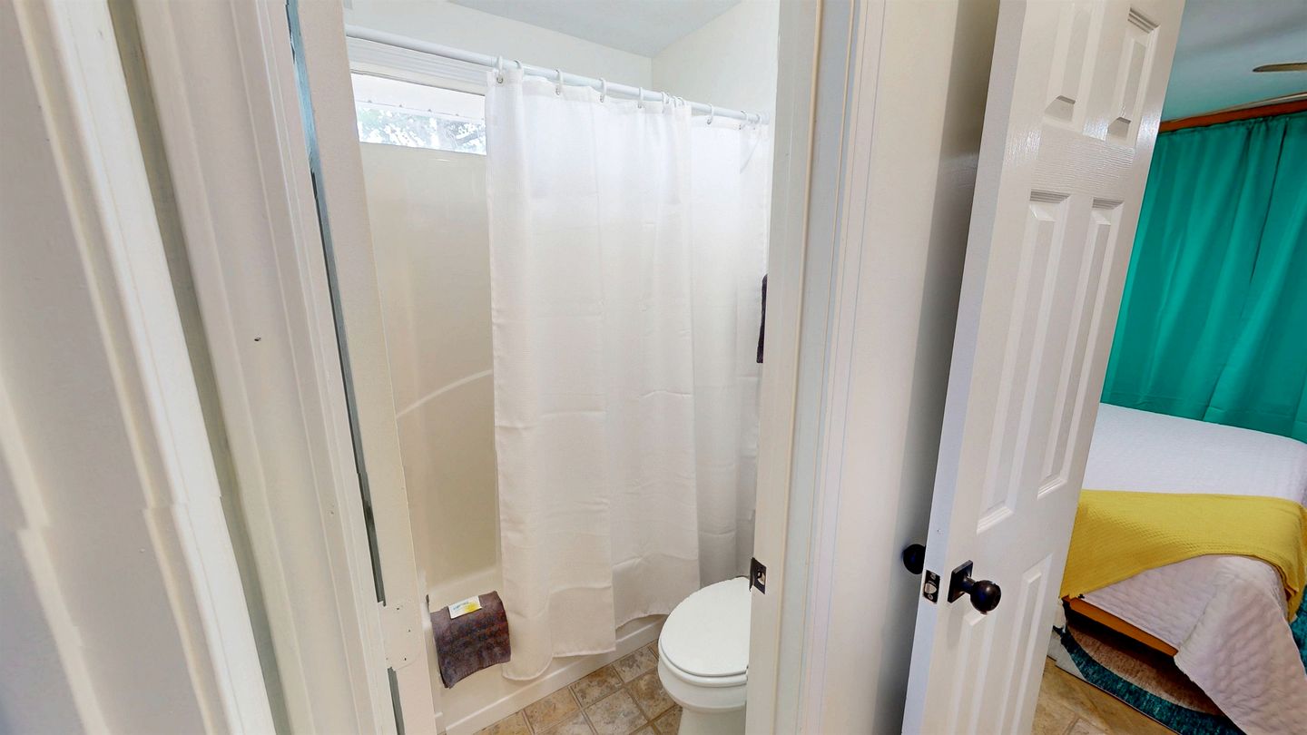 Charming Beachside Home with Private Patio & Dog-Friendly Policy near Surfside Shores, Gulf Shores, AL