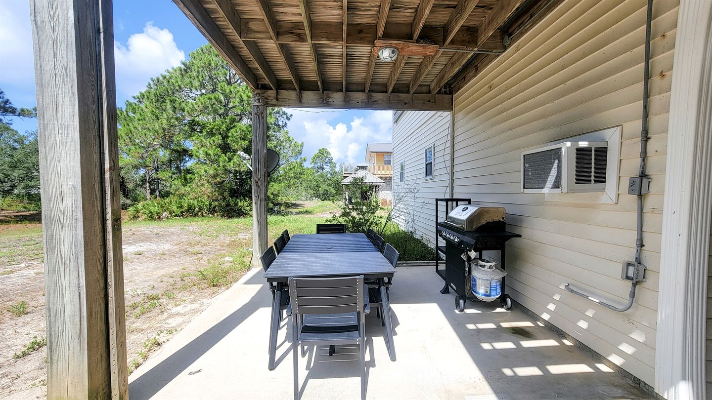 Charming Beachside Home with Private Patio & Dog-Friendly Policy near Surfside Shores, Gulf Shores, AL