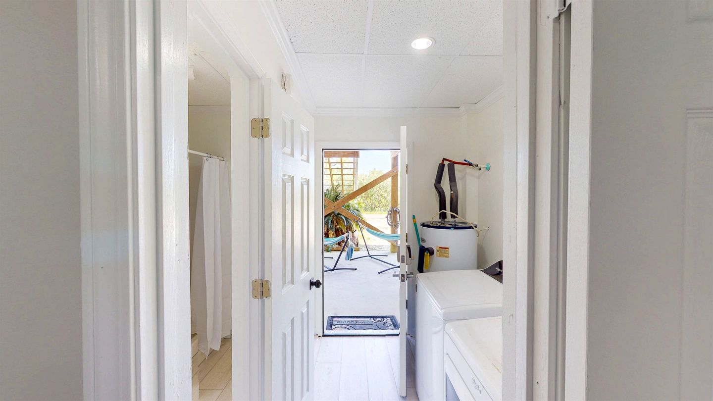 Charming Beachside Home with Private Patio & Dog-Friendly Policy near Surfside Shores, Gulf Shores, AL
