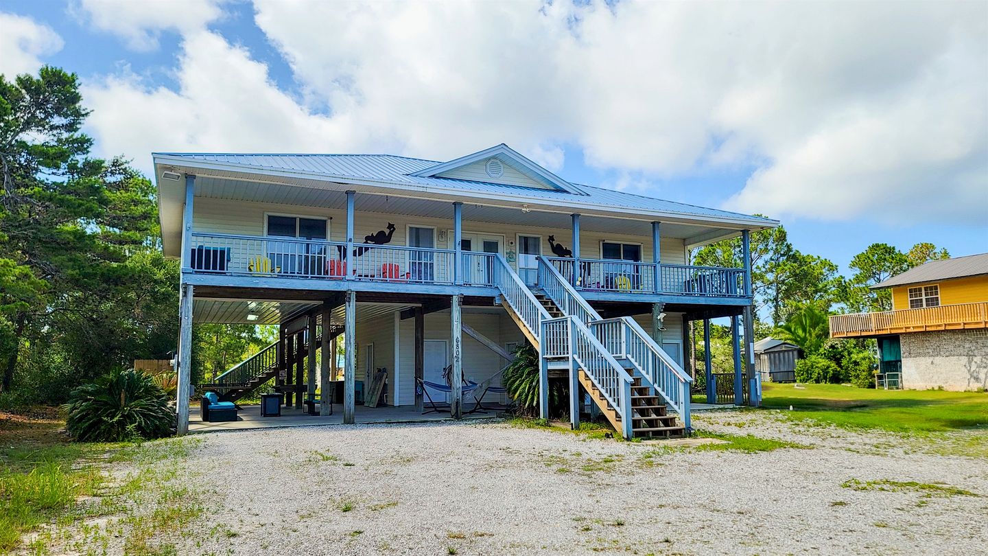 Charming Beachside Home with Private Patio & Dog-Friendly Policy near Surfside Shores, Gulf Shores, AL