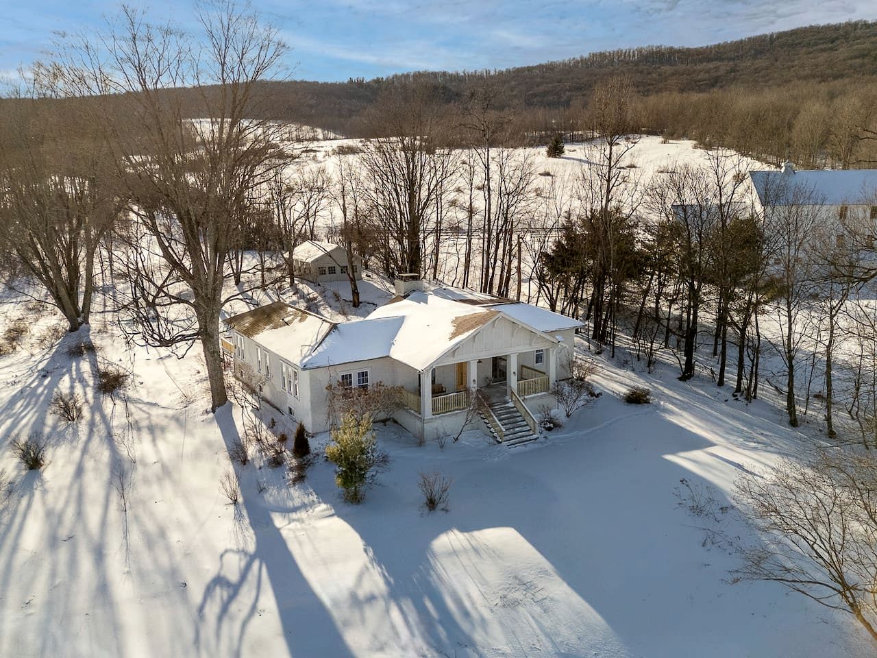 Charming Spanish Courtyard Retreat with Garden & Porch Views in Margaretville, New York