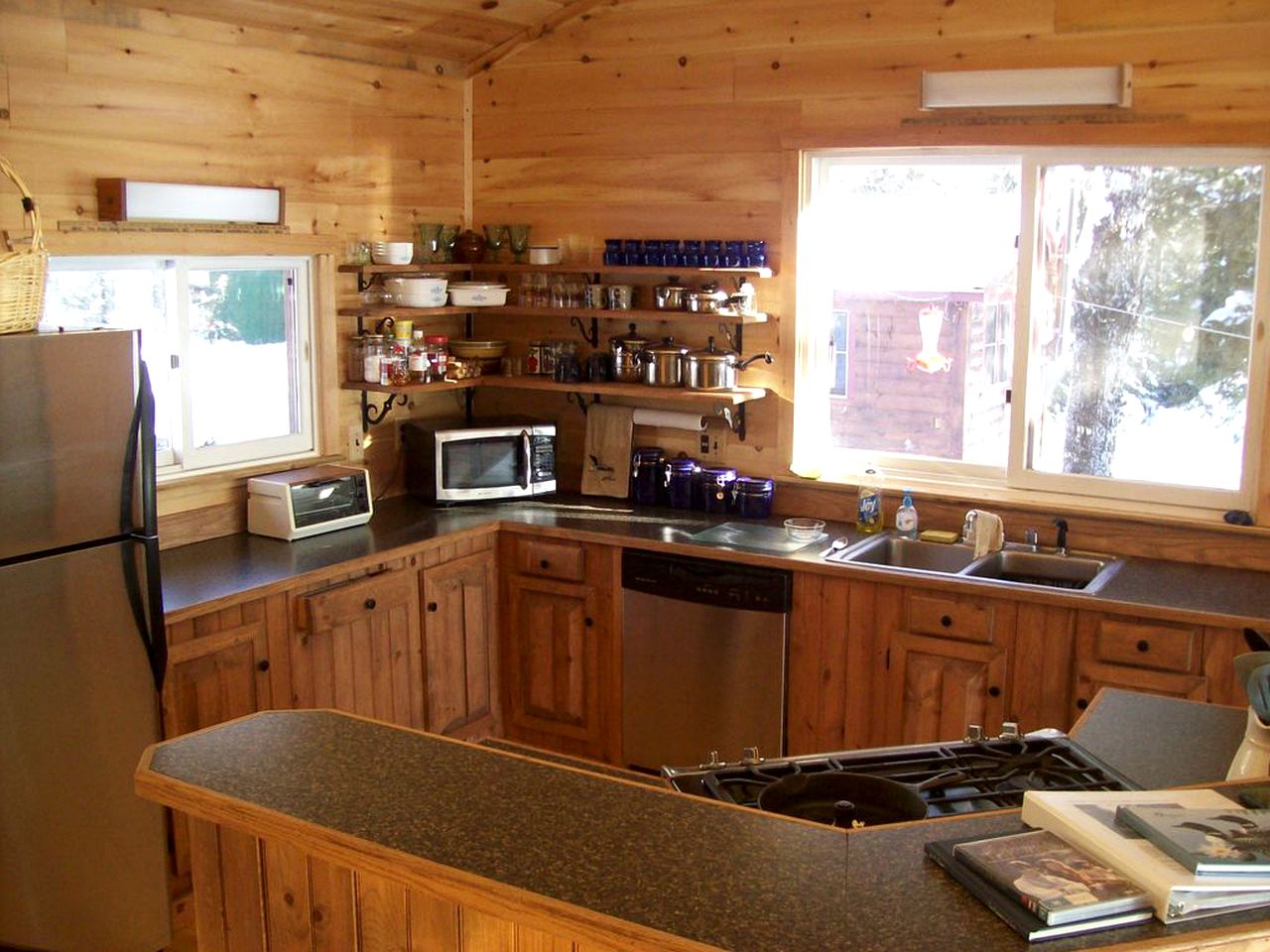 Charming Lakefront Cabin Rental with a Fire Pit near Brownville, Maine