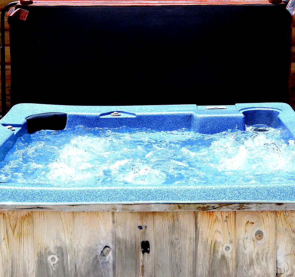 Stately Log Cabin with a Pool for a Group Getaway near Chickamauga, Georgia