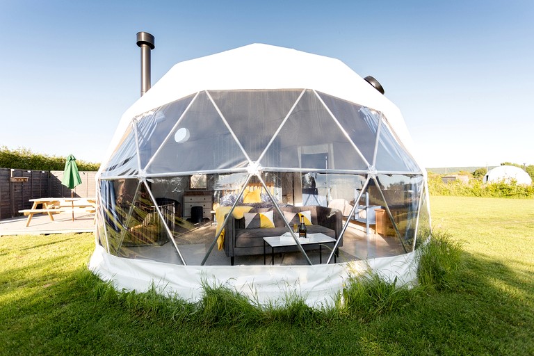 Solar-Powered Geodesic Dome with Wood-Burning Stove and an Outdoor Bath, in Othery, England