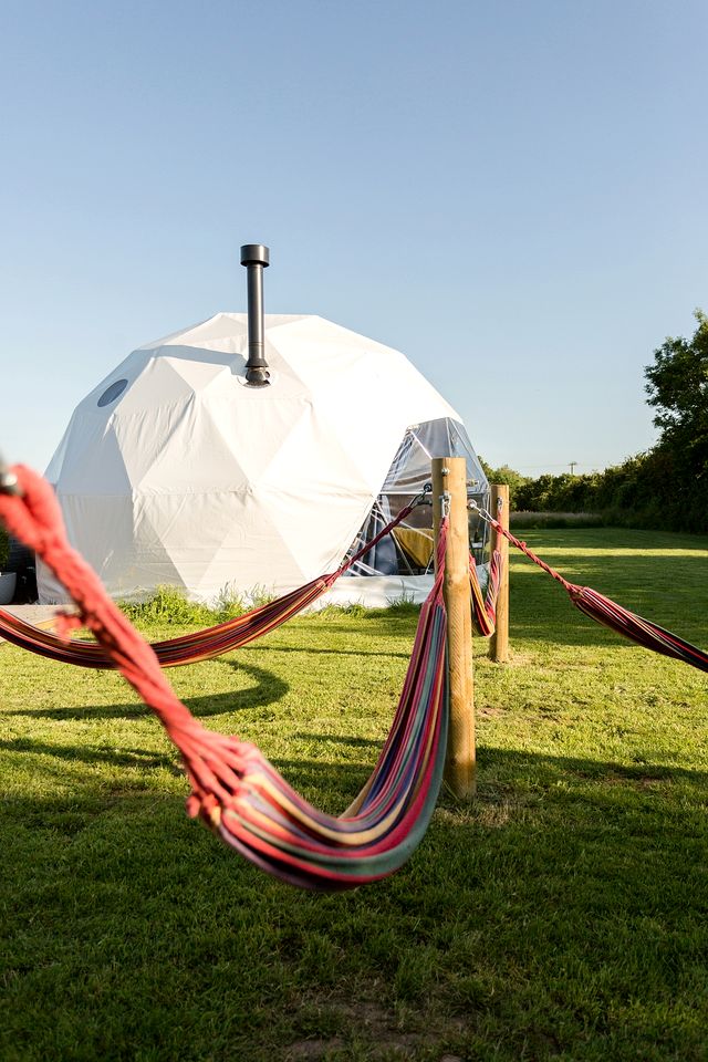 Solar-Powered Geodesic Dome with Wood-Burning Stove and an Outdoor Bath, in Othery, England