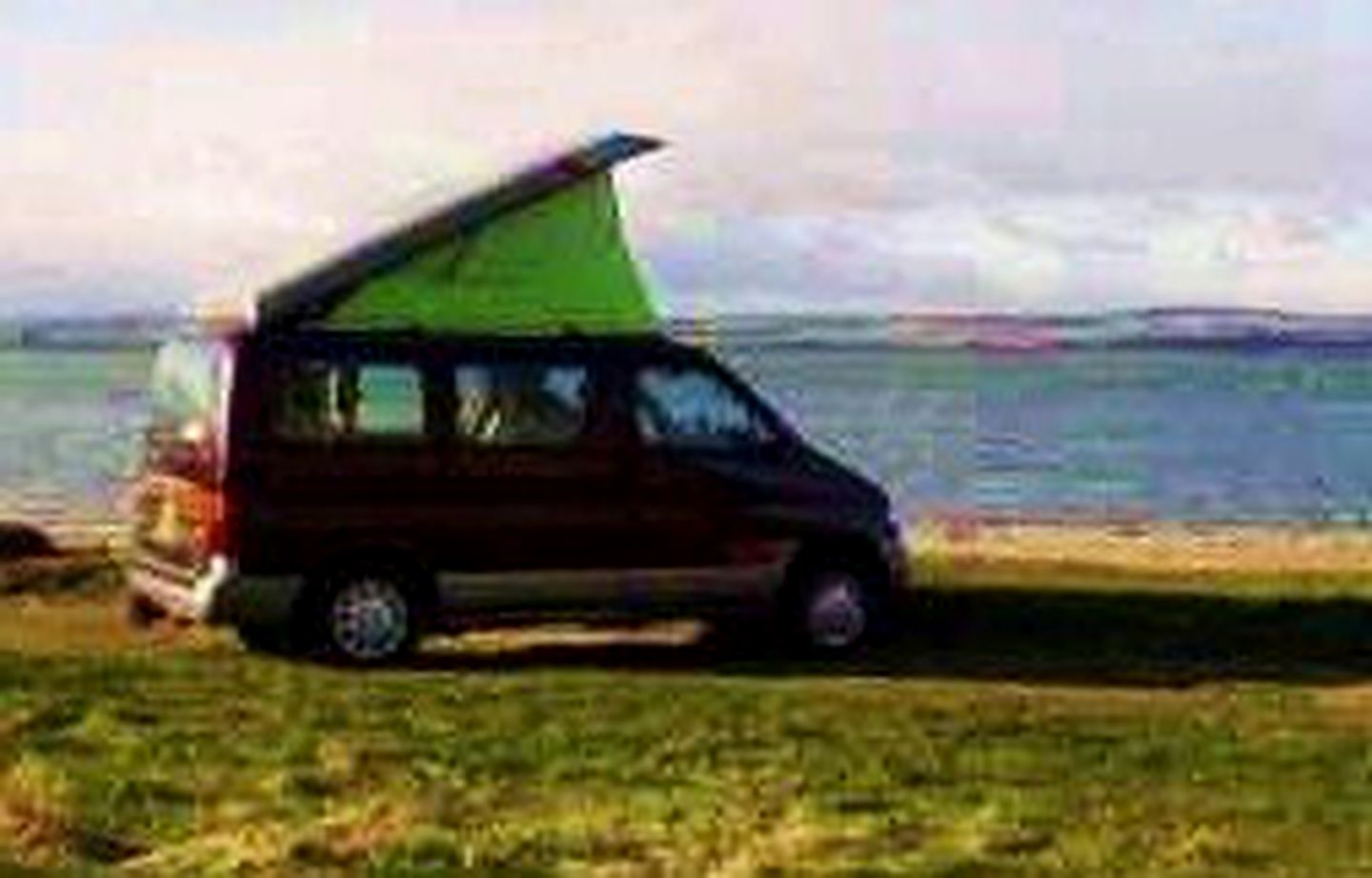 Electric Pop-Top Camping Van for Travelers to Explore the Auckland Region