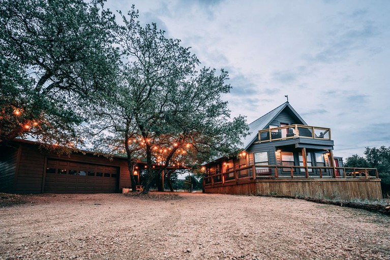 This Texas Hill Country getaway comes with plenty of outdoor entertaining space.