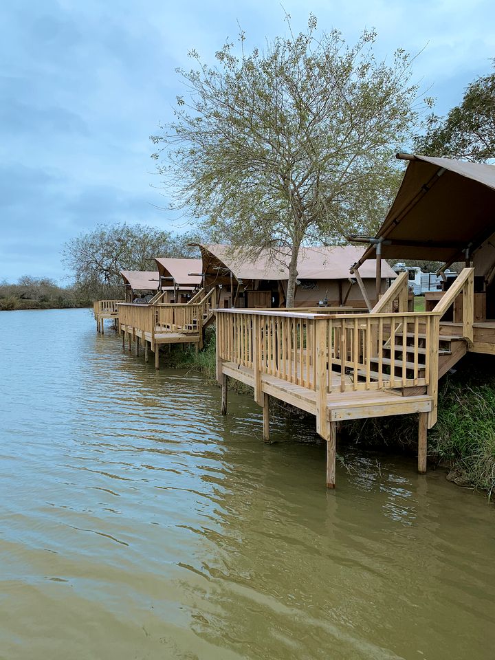 Comfortable Safari Tent with Riverfront Views near Space X's Launch Site, Perfect for a Texas Glamping Getaway