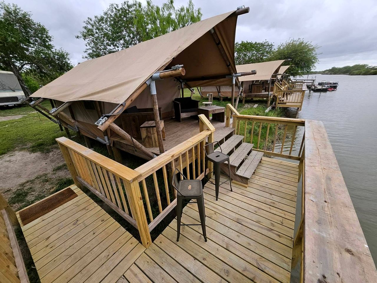 Comfortable Safari Tent with Riverfront Views near Space X's Launch Site, Perfect for a Texas Glamping Getaway