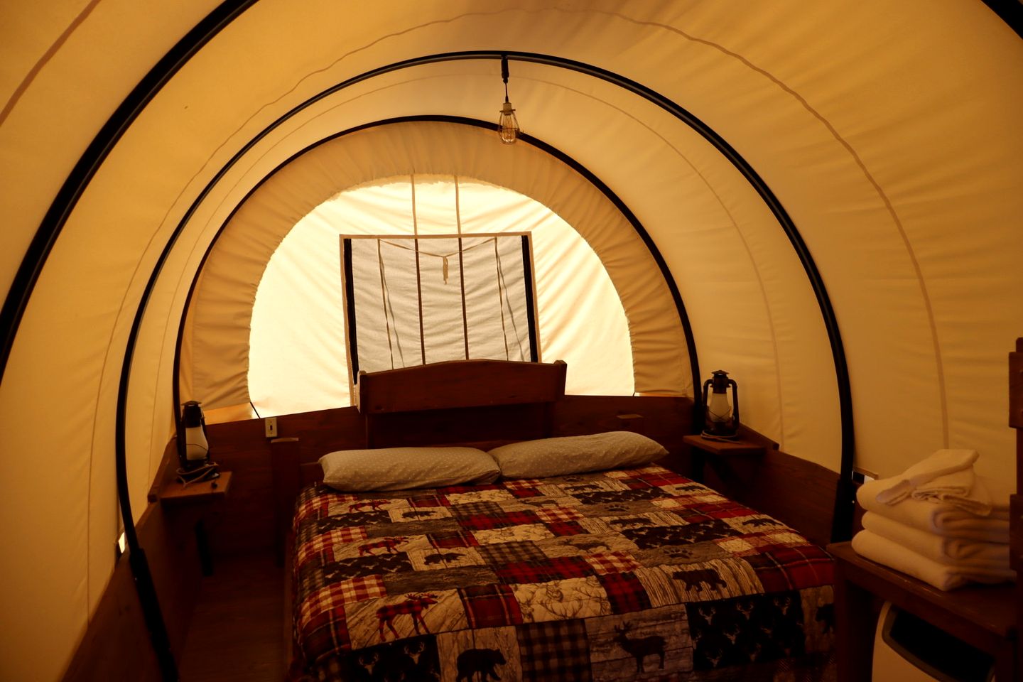 Rustic Conestoga Wagon Stay with Lodge Amenities near Boulder Creek, Montana