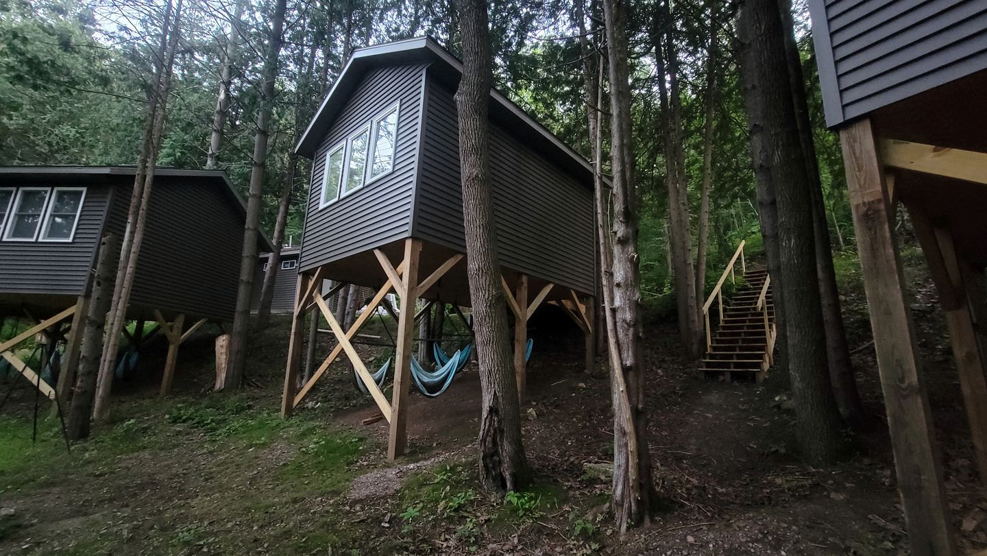 Cozy Up in this Cute Cabin Treehouse with Views of the Bluff Woodlands, Minnesota
