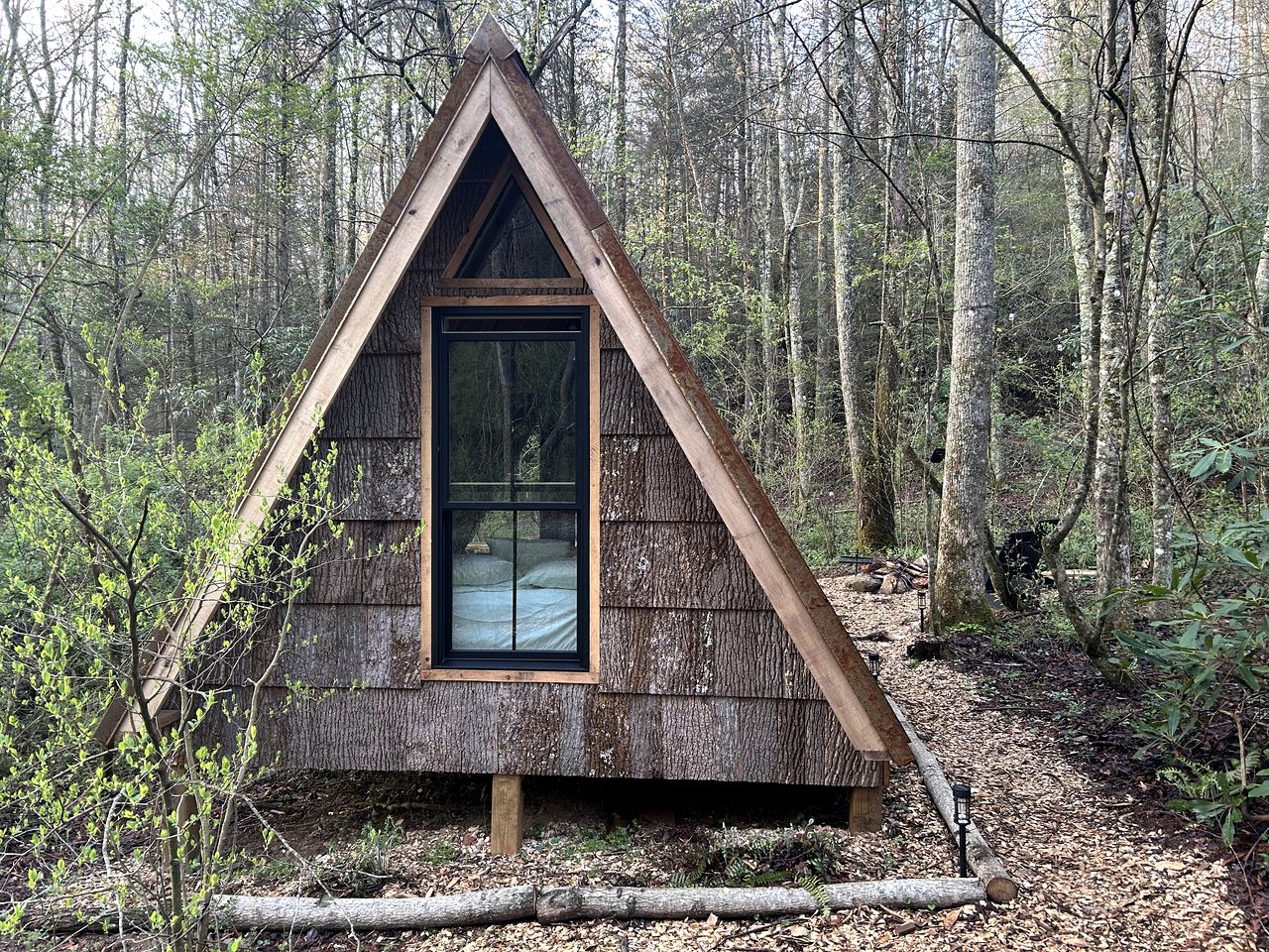 Secluded Off-Grid Cabin Retreat with Fire Pit & Sauna in Zirconia, North Carolina