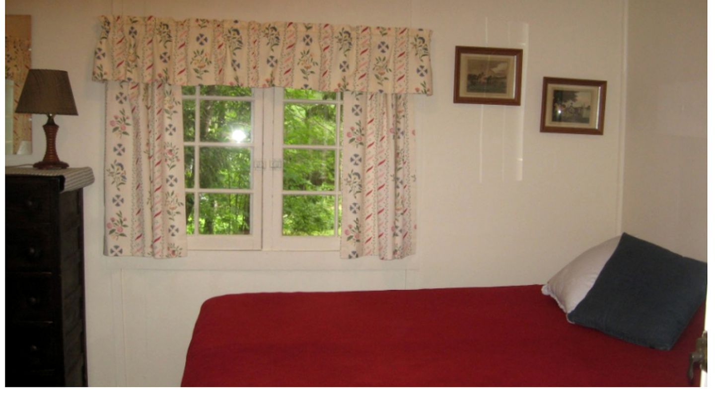 Secluded Cabin Nestled in the Woods near Crystal Lake, New Hampshire