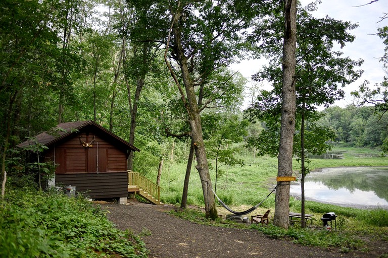 Beautifully Restored Historic Scout Cabin with Pond View for a Peaceful Romantic Escape in Troy, Wisconsin
