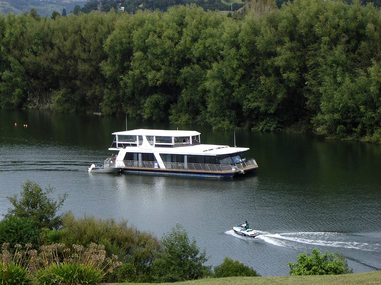 Floating Luxury Getaway on the Peaceful Waikato River of New Zealand