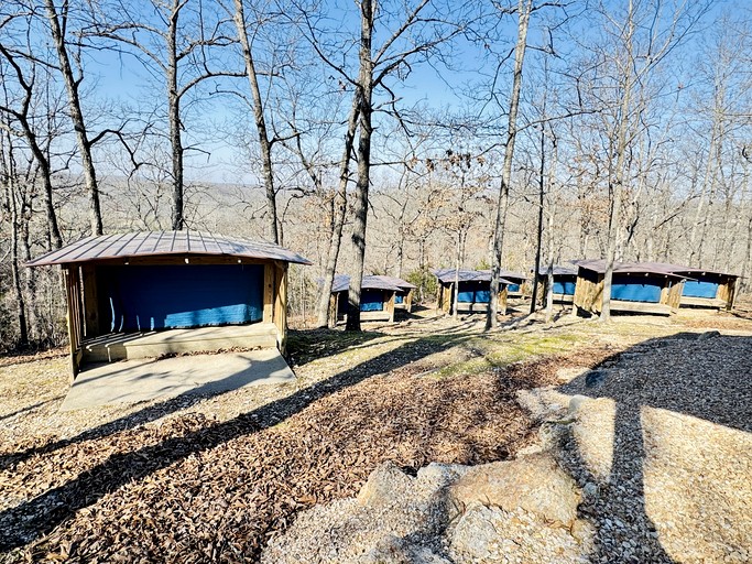 Adventurous Family-Friendly Riverside Glamping Nests with Trampoline Beds near Big Niangua River, Macks Creek, Missouri