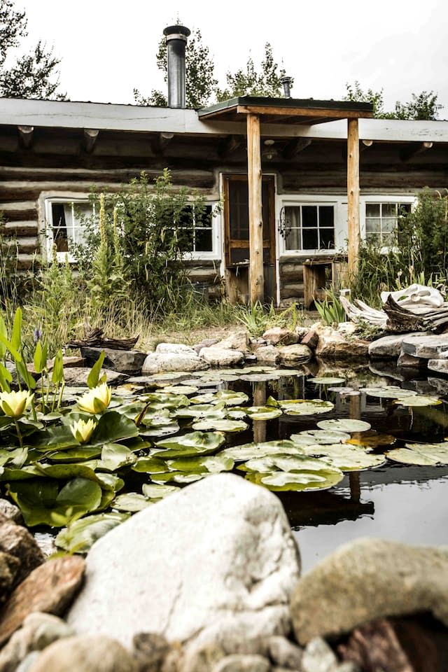 Log Casita Overlooking Pond and Waterfall near Taos, New Mexico