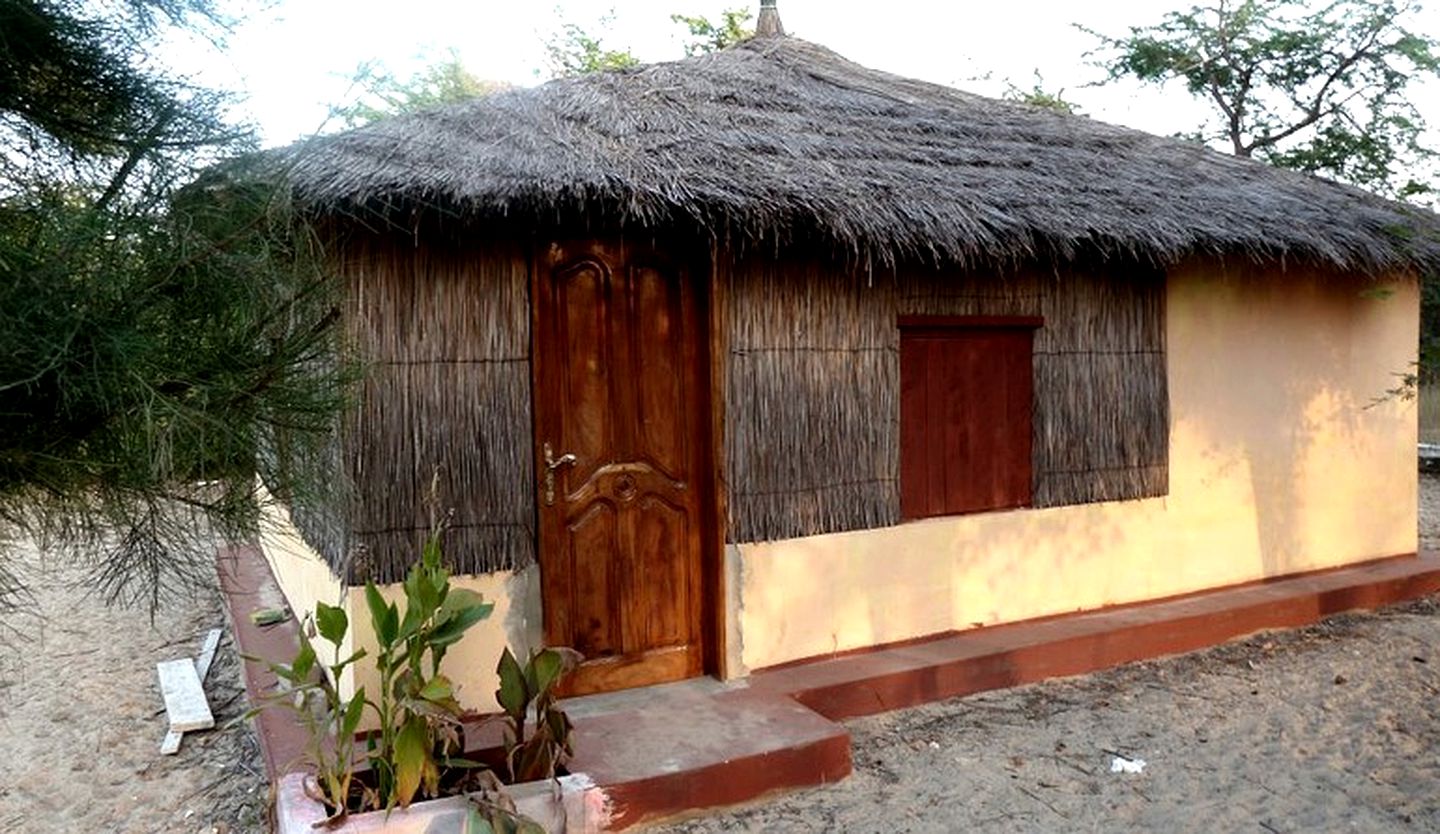 Eco-Friendly Huts on Tranquil Island Retreat, Gambia