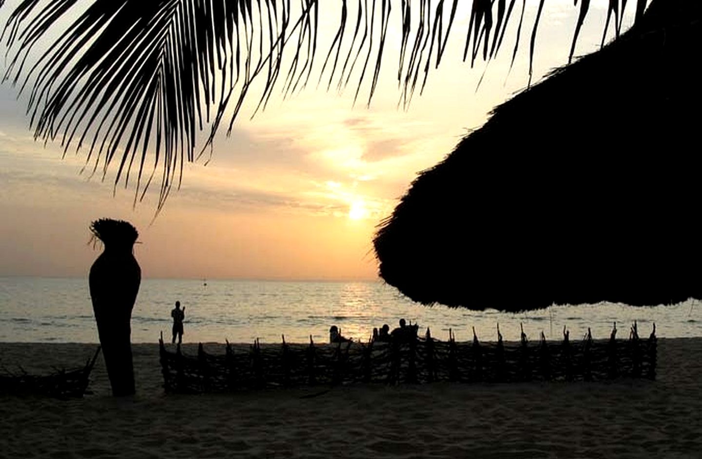 Elegant Beachside Huts near a Vibrant Port Town in Senegal, Africa