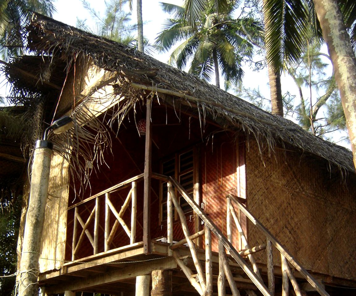 Elevated Thatched Cabins on Beach Village Resort, India