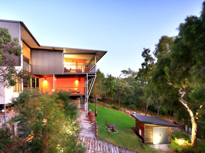 Two-story lodge with a backyard on Fraser Island, Queensland.
