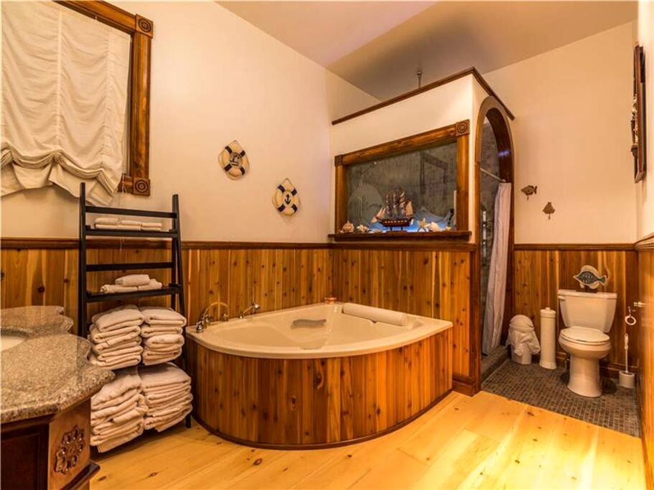 Enormous Lakefront Villa with Interior Pool, Game Room and Gym Space in Lac des Plages, Quebec