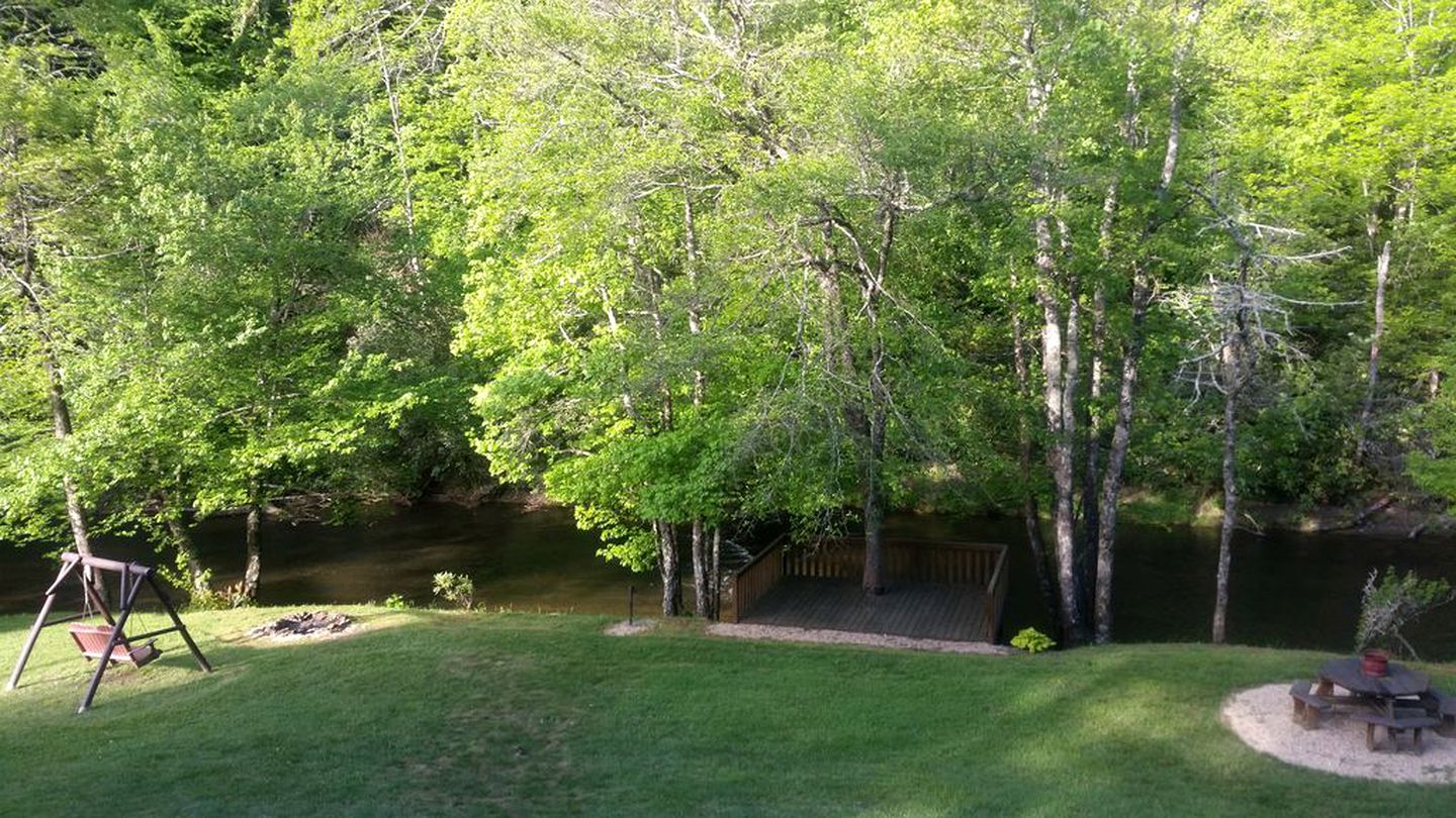 Riverfront Log Cabin Rental near Stone Mountain State Park, North Carolina