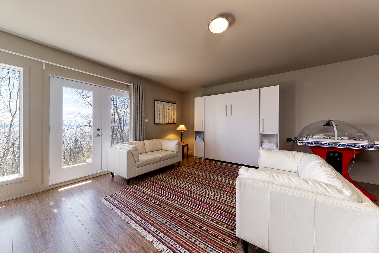 Luxurious Contemporary Retreat with Hot Tub, Ping Pong, and River Views near Baie-Saint-Paul, Quebec