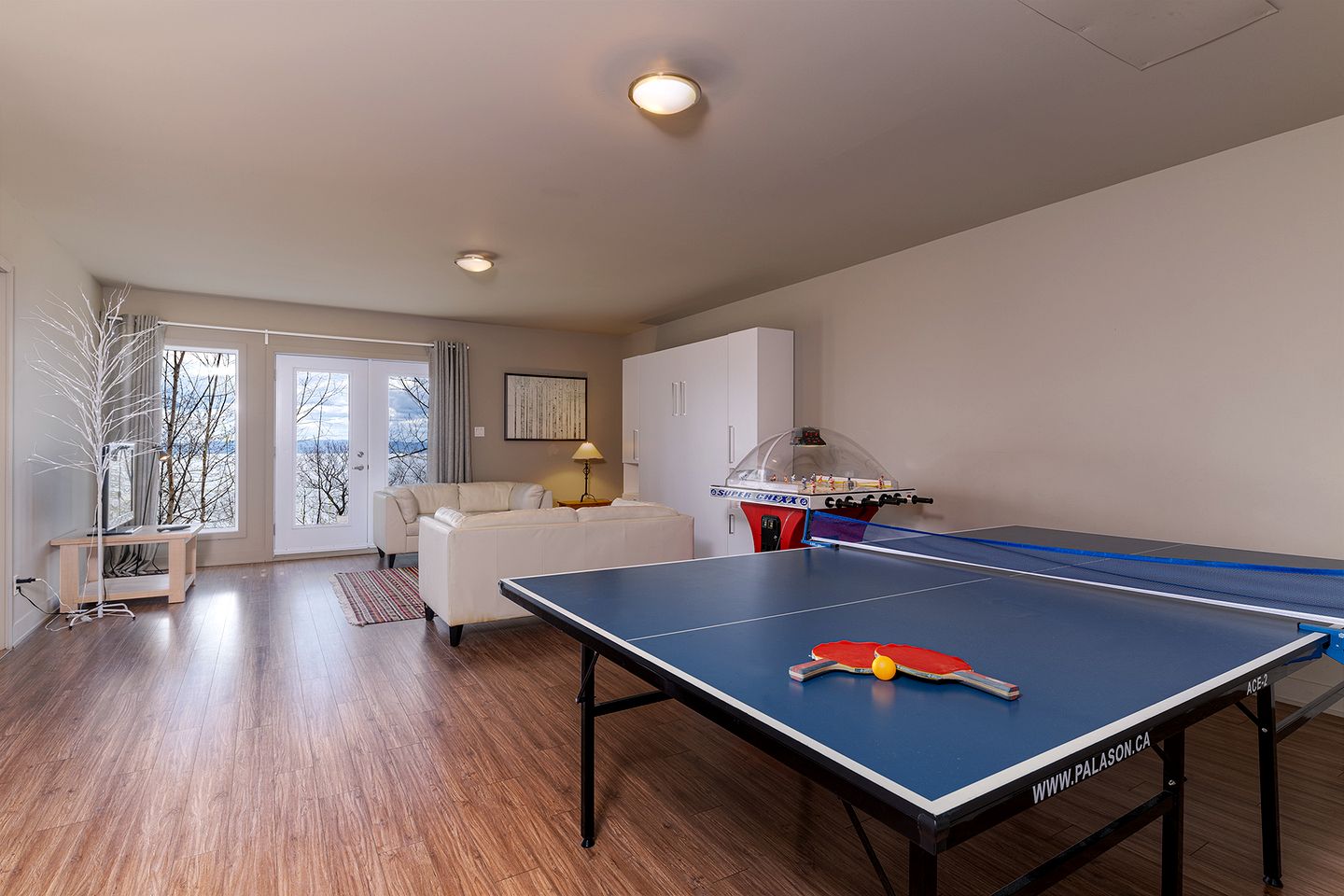 Luxurious Contemporary Retreat with Hot Tub, Ping Pong, and River Views near Baie-Saint-Paul, Quebec