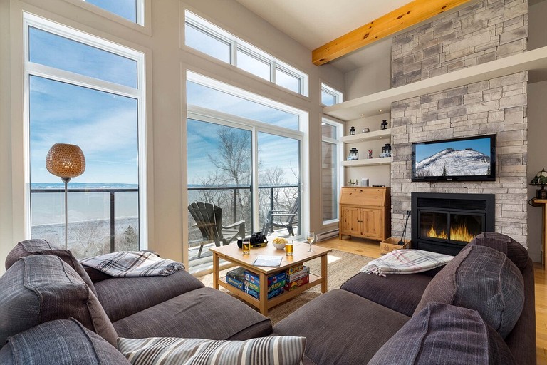 Luxurious Contemporary Retreat with Hot Tub, Ping Pong, and River Views near Baie-Saint-Paul, Quebec